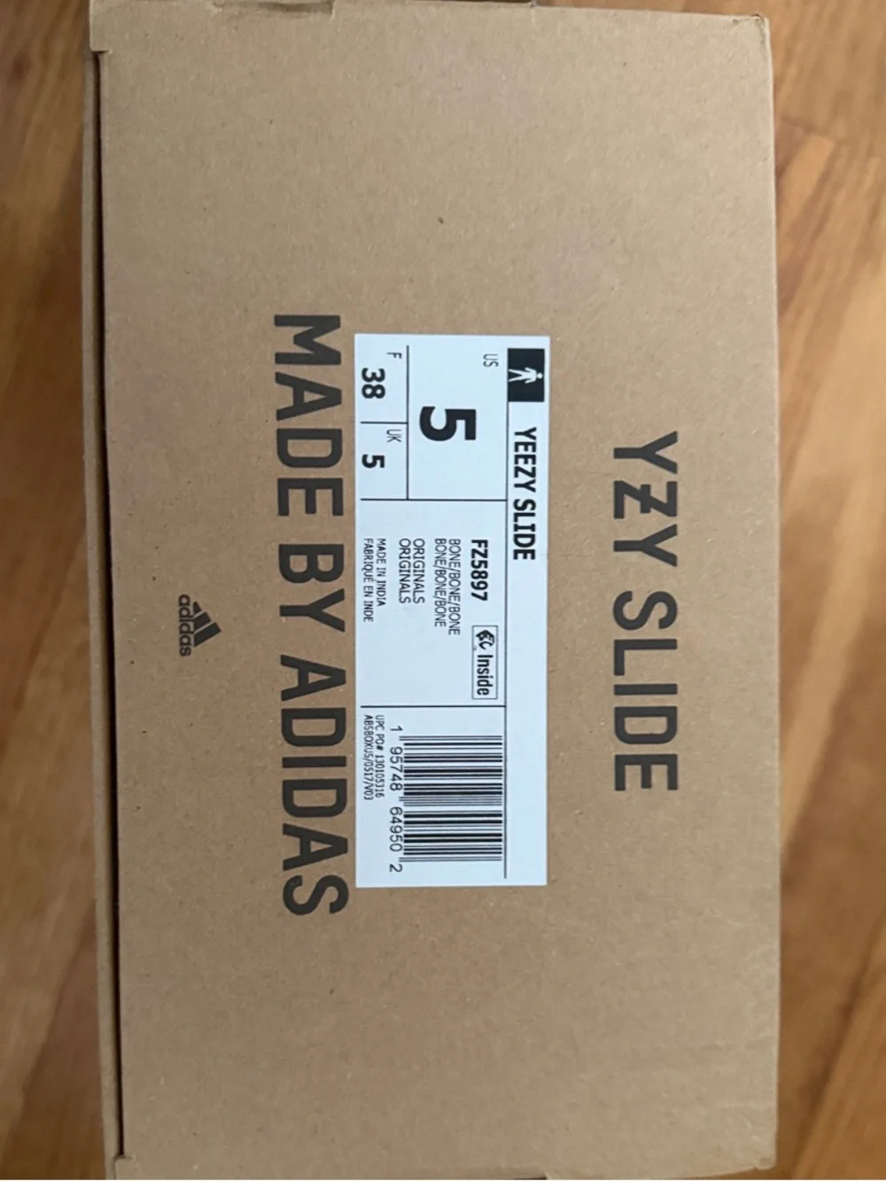 Yeezy Ribbed Slide Sandals in Bone